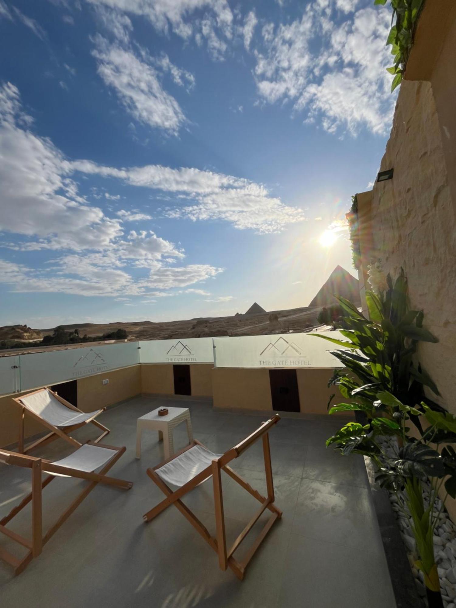The Gate Hotel Front Pyramids & Sphinx View Kafrat al Jabal Exterior photo